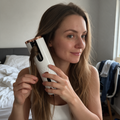 Woman curling her hair with the CurlWrap